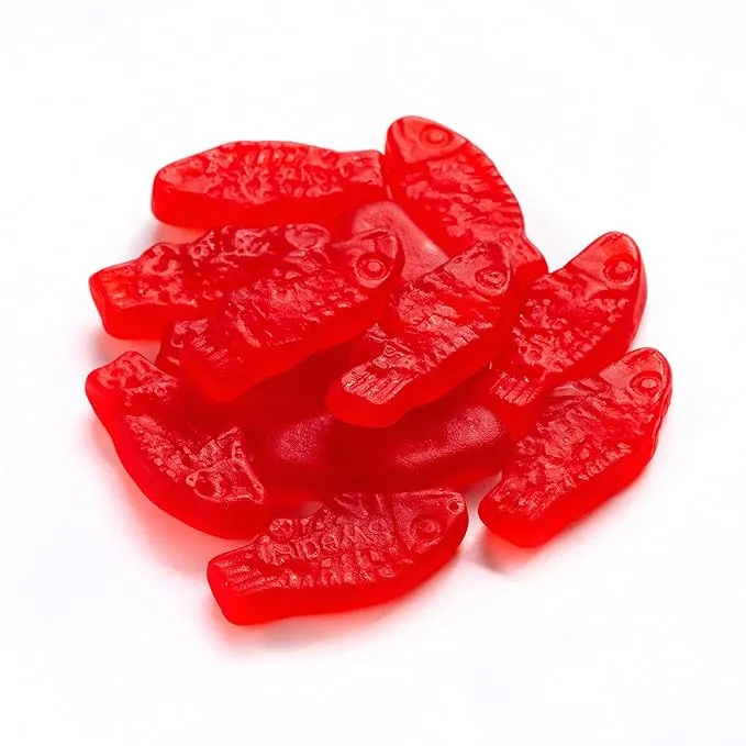 Close-up of Swedish Fish Mini Red Chewy Candy – Soft and Fruity Gummy Candy in Classic Fish Shape – Popular for Snacking and Sharing