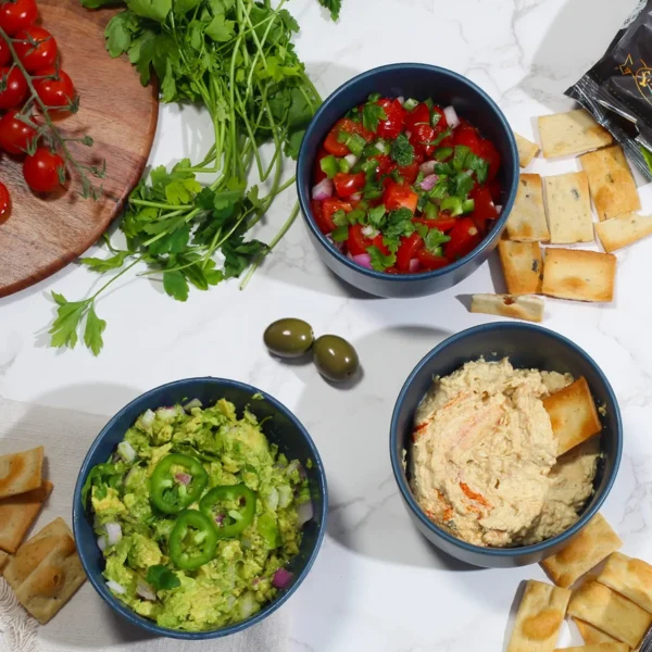 Oloves Crackers with Guacamole - A flavorful pairing of Oloves crackers with fresh guacamole dip