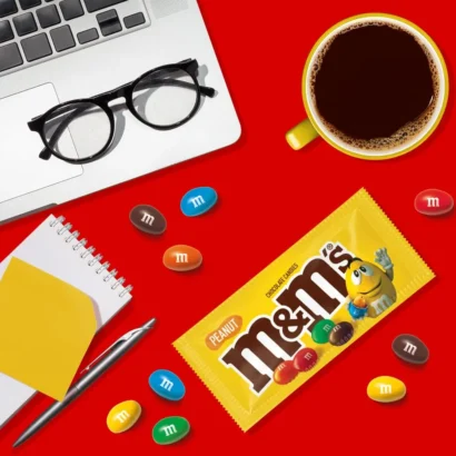 Person Enjoying M&M’S Peanut Chocolate Candy – Perfect On-the-Go Snack